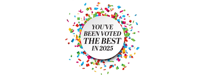 Orthodontist The Woodlands TX You've Been Voted The Best 2025 A circle with the words "You've Been Voted The Best in 2025". The circle is surrounded by confetti.